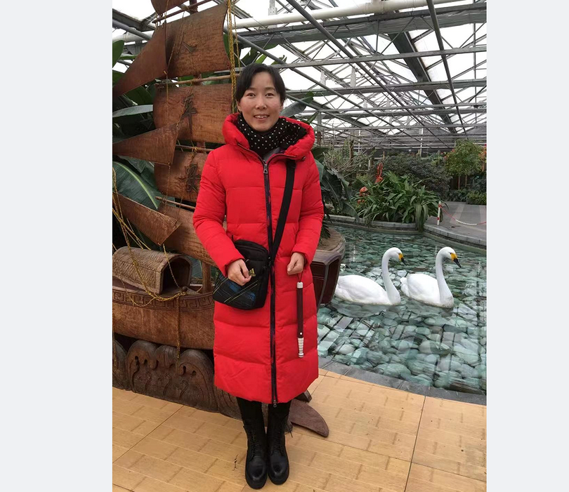 A picture of a female blind Christian named Xiangqi