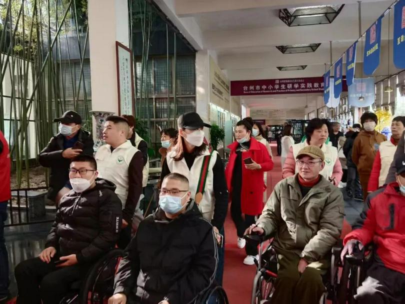 Disabled people in wheelchair were visiting Wu Zixiong Glass Art Museum with help of volunteers from Taizhou Municipal Charity Association in Zhejiang, on February 18, 2023.