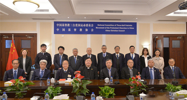 Staff members of CCC&TSPM and  the delegation from the Hong Kong Chinese Christian Churches Union (HKCCCU) took a group picture in the station of CCC&TSPM on March 14, 2023.