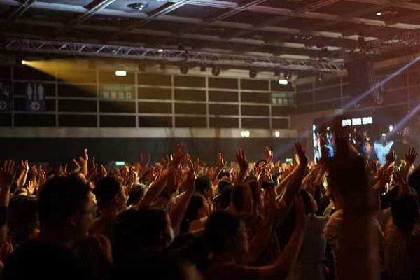 People worshiped God during a worship revival summit themed "Revival" held by Stream of Praise (SOP) Music Ministries at the Hong Kong Convention and Exhibition Center on August 6th, 2023.