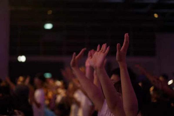 People worshiped God during a worship revival summit themed "Revival" held by Stream of Praise (SOP) Music Ministries at the Hong Kong Convention and Exhibition Center on August 6th, 2023.