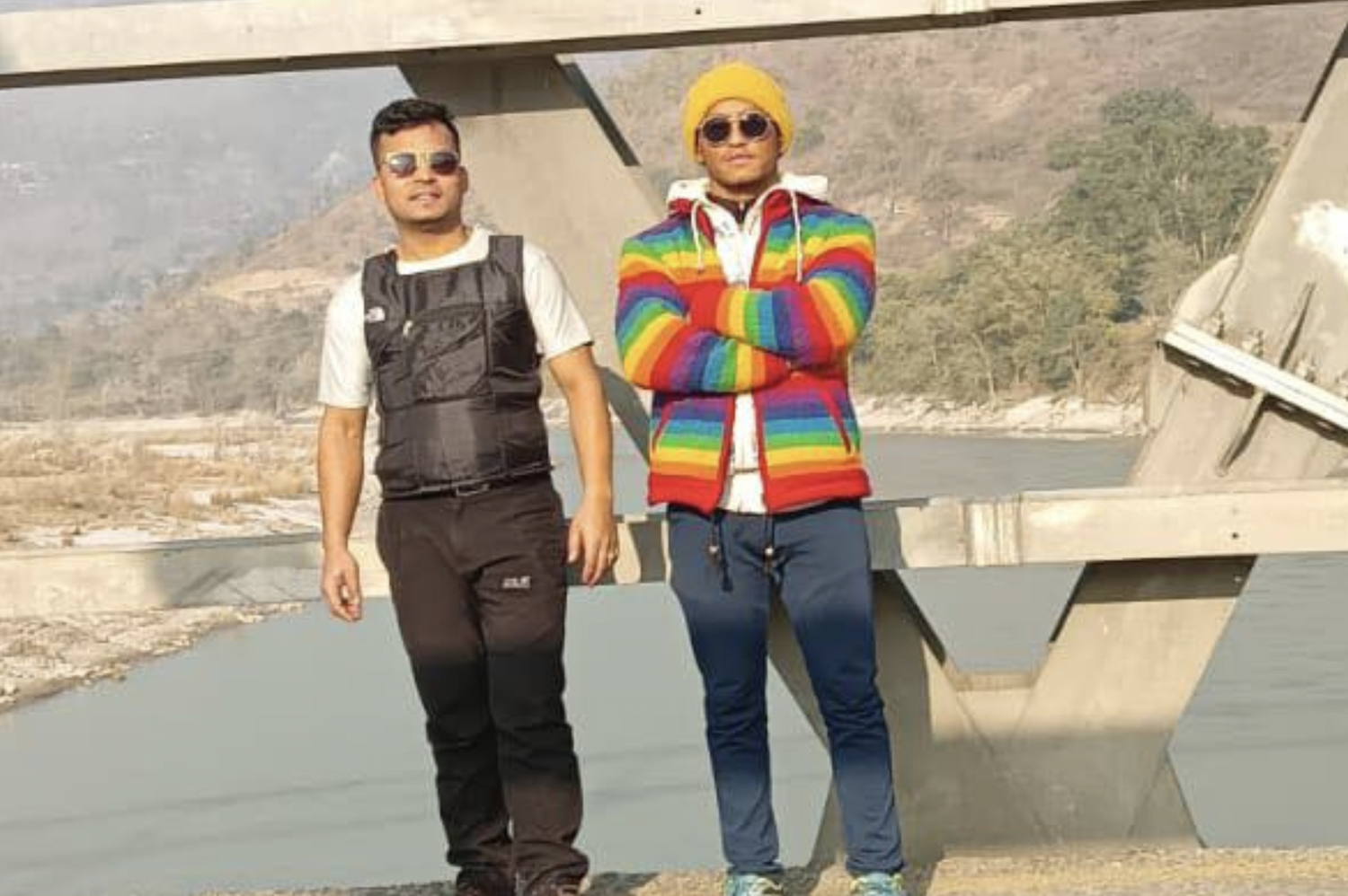 A photograph of Krishna Bahadur BK (in the black jacket) and Dhirendra Sunar