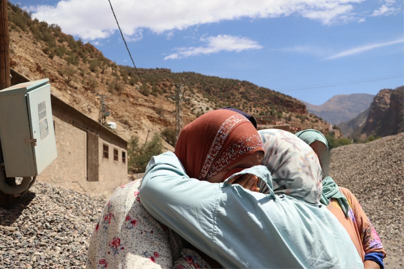 HAF staff member, Amina Hajjami, consoles earthquake survivors in Ijoukak, Al Haouz. September 12, 2023.