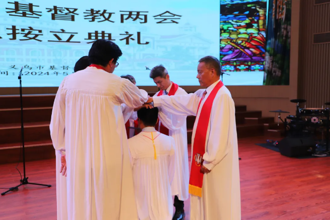 The laying-on of hands ceremony was conducted at New Grace Church in Yiwu, Zhejiang, on May 31, 2024.