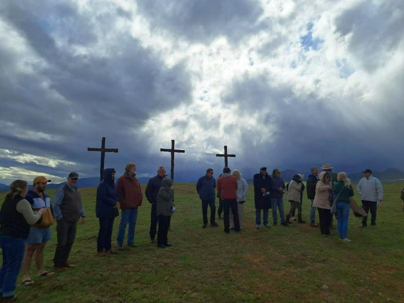 Prayer at the foot of the three crosses on the site of this weekend’s MMC Western Cape