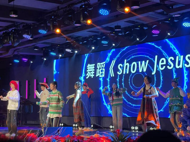 Young Christians in festive clothes performed in celebration of Christmas during the youth gospel meeting at Yuyao Church in Ningbo City, Zhejiang Province, on December 25, 2024.