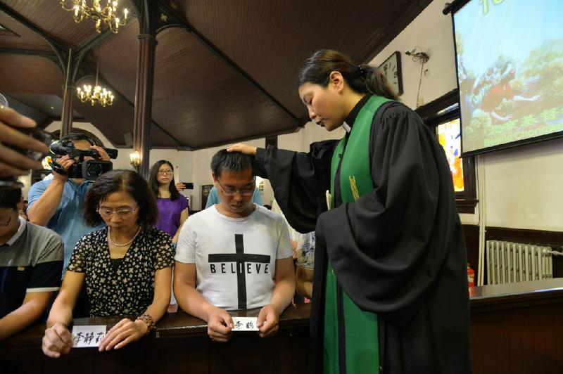 Baptism in Chongwenmen Church on on June 29, 2016