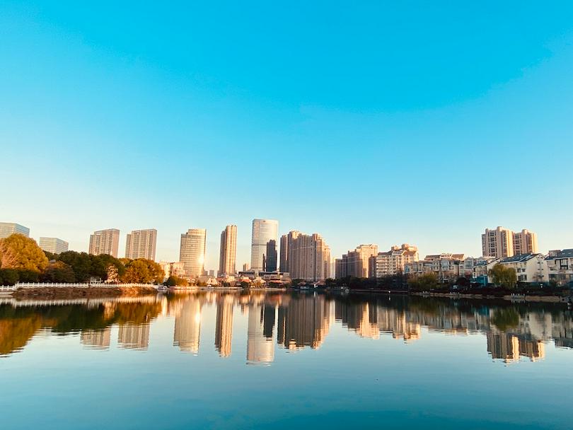 A tranquil cityscape at sunrise
