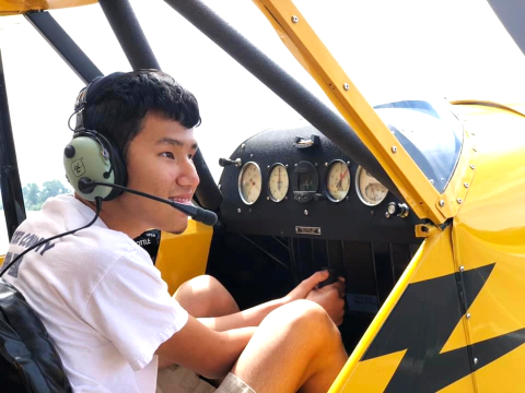 Joseph gazes at the blue sky with his "heart" eyes, soaring toward his dream.