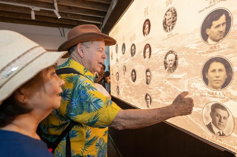 Gordon Trimble, grandnephew of Lydia Trimble, an American missionary working in China for more than 50 years, reviwed the photos of his ancestors with his wife in Kuliang , Fuzhou, Fujian Province, on June 23, 2024.
