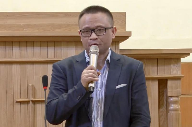 A screenshot of Rev. Liang Pu preaching on an unknown day