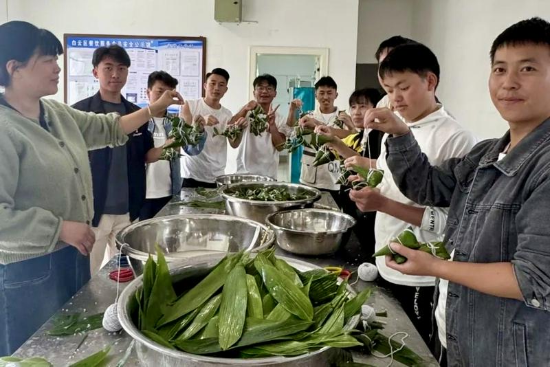 Around the Dragon Boat Festival, teachers and students at Guizhou Bible School gather to make handmade zongzi in celebration of the occasion.