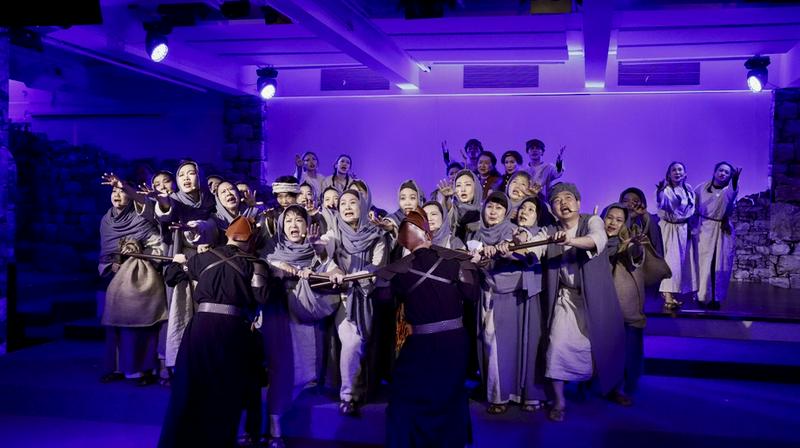 A group of Christians reenacted a scene of soldiers dispersing refugees during the musical at Qiaocheng Church in Shenzhen, Guangdong Province, on May 10, 2025.