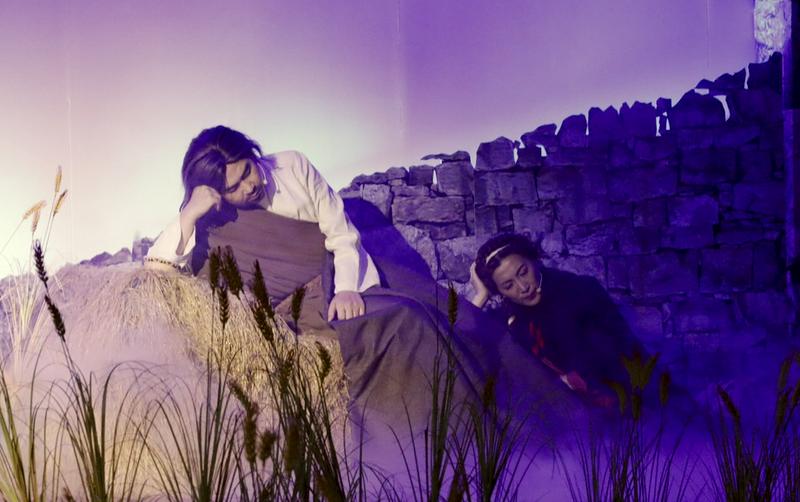 Two believers enacted the scene of Ruth warming Boaz’s feet at night during the musical at Qiaocheng Church in Shenzhen, Guangdong Province, on May 10, 2025.