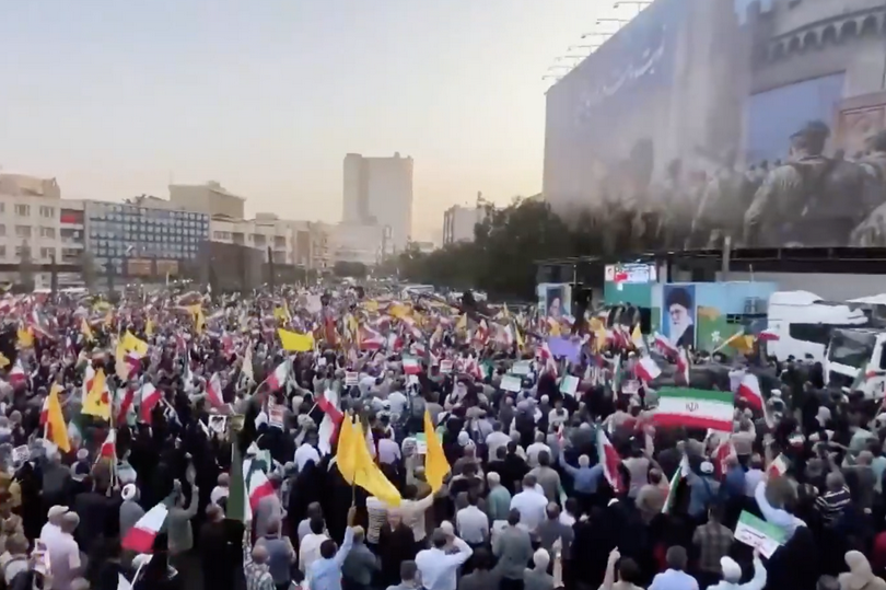 In central Tehran, carrying Iranian flags, thousands remained defiant and shouted "Death to Israel" and "Death to America" on an unknown day.
