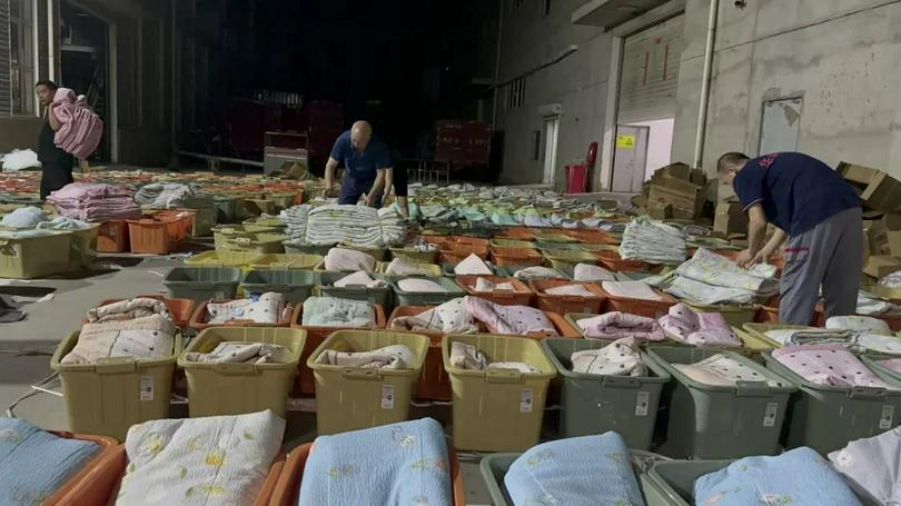 Volunteers were packing emergency relief kits.