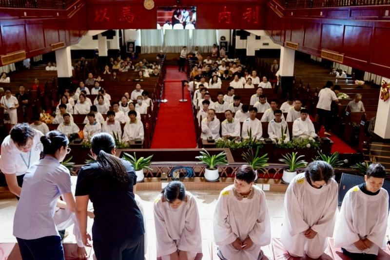 Baptism candidates were baptized on stage at Ningbo Centennial Church in Ningbo City, Zhejiang Province, on July 27, 2025.