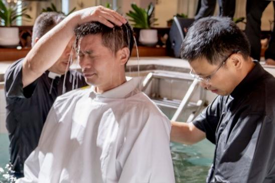 A Christian man took part in the immersion baptism ceremony at Ningbo Centennial Church in Ningbo City, Zhejiang Province, on July 27, 2025.
