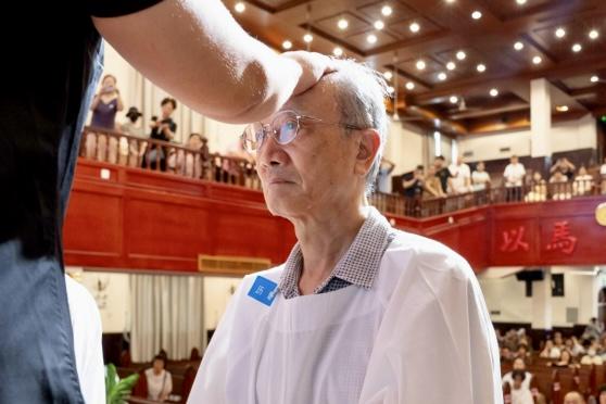 An elderly Christian received baptism at Ningbo Centennial Church in Ningbo City, Zhejiang Province, on July 27, 2025.