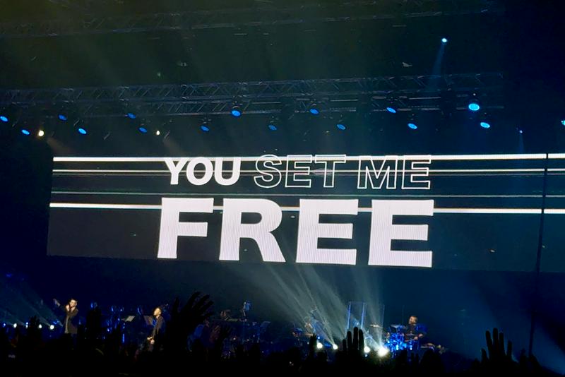 The English lyrics of Stream of Praise Music Ministries's newly created song were presented on stage at the Hong Kong Convention & Exhibition Centre on August 2, 2025.