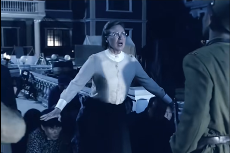 The female doctor who protects wounded Chinese civilians from a Japanese soldier in the film. Her character is inspired by American missionary Minnie Vautrin.