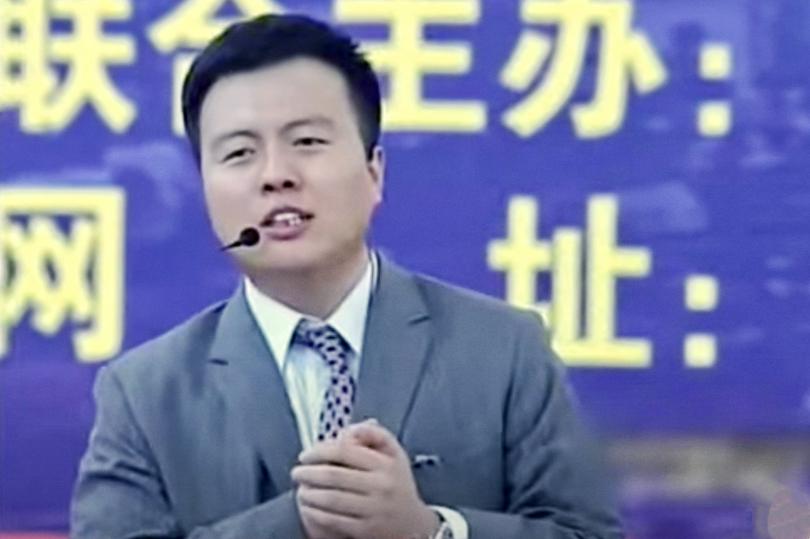 A screenshot of a video of Yang Taoming giving a speech on an unknown day.