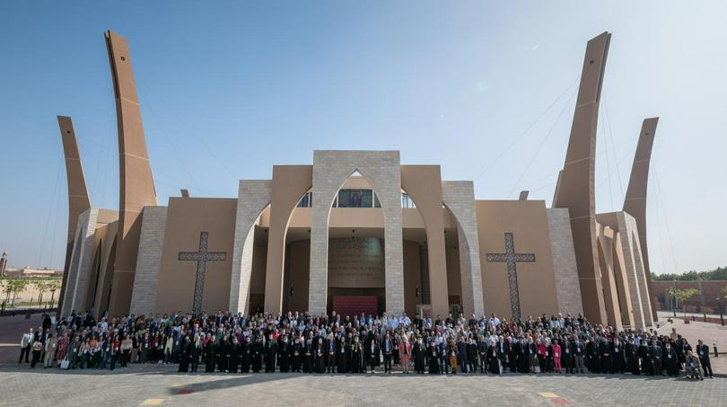 24 October 2025, Wadi El Natrun, Egypt: People gather for a photo on opening day of the World Council of Churches Sixth World Conference on Faith and Order taking place 24-28 October 2025 in Wadi El Natrun, Egypt, around the theme "Where now for visible unity?"