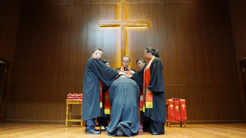 The pastorate conducted laying on of hands for a newly ordained church staff during an ordination ceremony at Transfiguration Church in Qingpu District, Shanghai, on October 30, 2025.