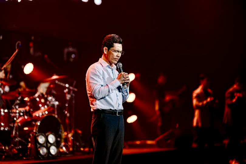 Rev. Lam Thien Loc offered a representative prayer at a prayer gathering for Vietnam attended by thousands of young Christians.