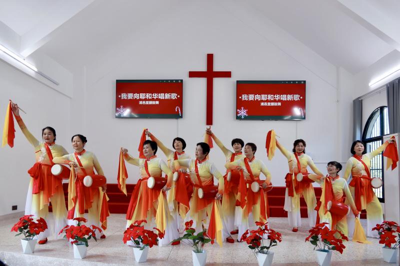 A group of Christian women staged a waist-drum dance during the Christmas praise gathering at Shancheng Church in Zhangpu, Zhangzhou City, Fujian Province, on December 6, 2025.