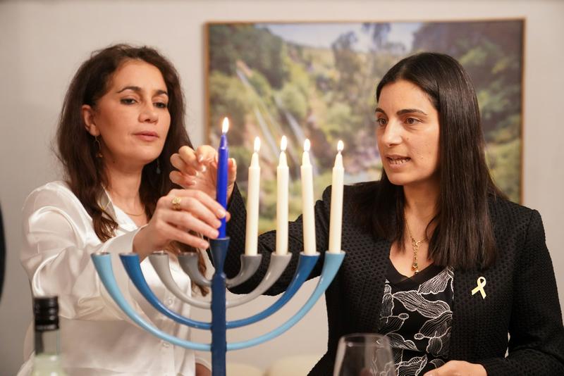 Ravit Baer, Consul General of Israel in Shanghai, invited Yael Gan, aunt of Ran Gvili, to light the four Hanukkah candles at Baer's residence in Shanghai, on December 17, 2025. 