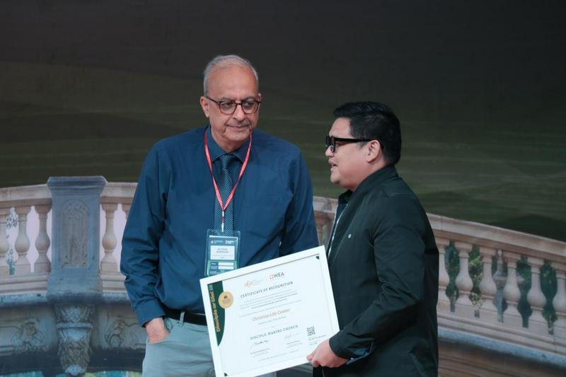 Botrus Mansour, secretary general of the World Evangelical Alliance, presented a certificate to Bishop Joel Montes during Plenary 1 at the Asia Conference on Church and Mission 2026 in Alabang, Metro Manila, Philippines, on June 10, 2026.