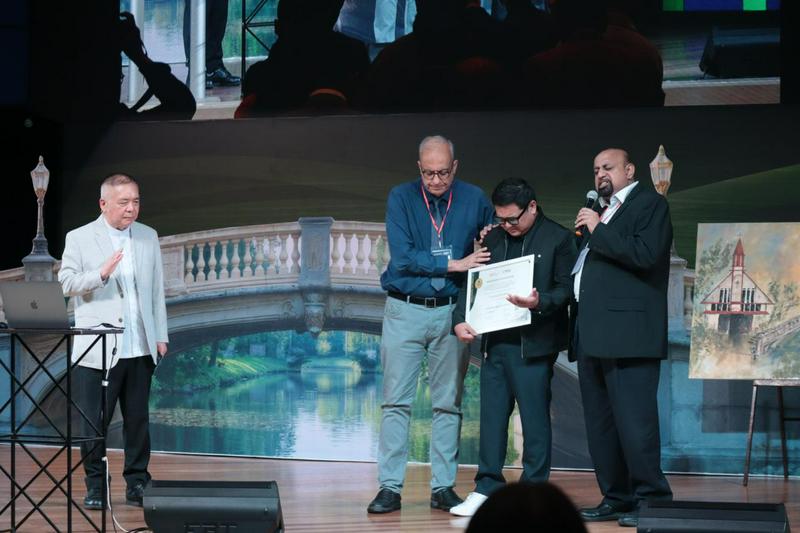 Godfrey Yogarajah, chairman of the Asia Evangelical Alliance and chair of the World Evangelical Alliance International Council, prayed for Bishop Joel Montes during Plenary 1 at the Asia Conference on Church and Mission 2026 in Alabang, Metro Manila, Philippines, on June 10, 2026.