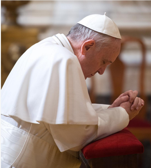 Pope Francis Kneels Down For Prayer