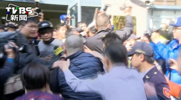 People beating the suspect