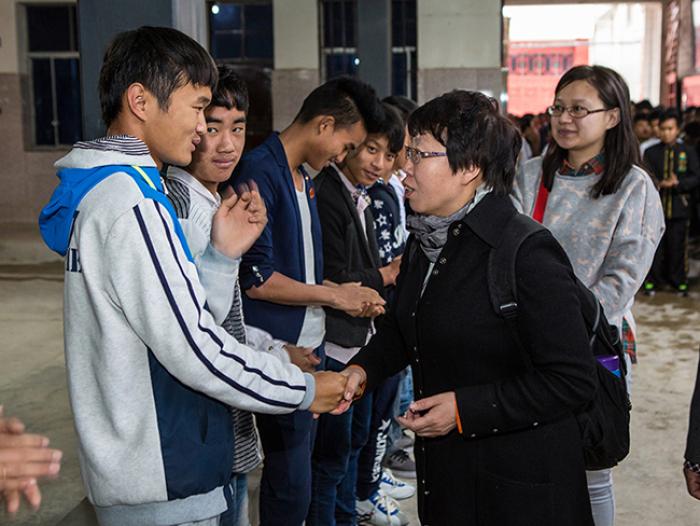 Rev. Bian Wenai and other church co-workers of Haidian Church with the students of Yiliang Christian Training Center on April 3, 2016.