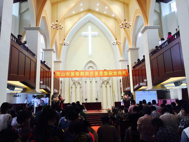 Pillars whose tops extending upwardly "form" the golden blooming lilies