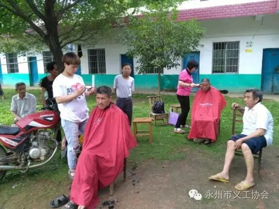 The volunteers cut the hair of seniors
