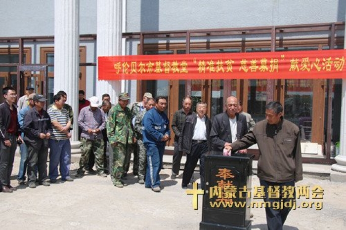 Members give donation for charity