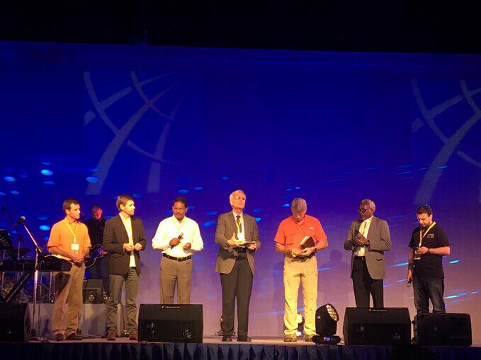 Pastors from different continents hold the communion service