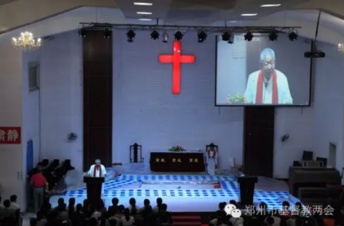 A pastoral staff gives a sermon in the church