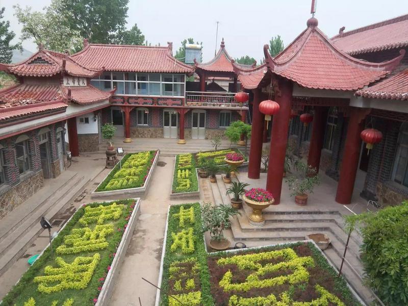 A side face of the church including the yard with several Chinese characters