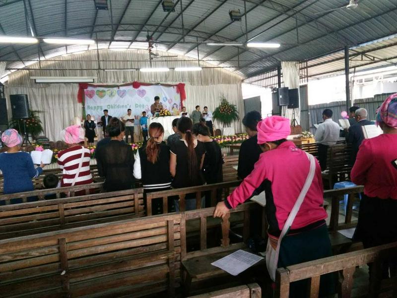 The believers worship in the temporary shed