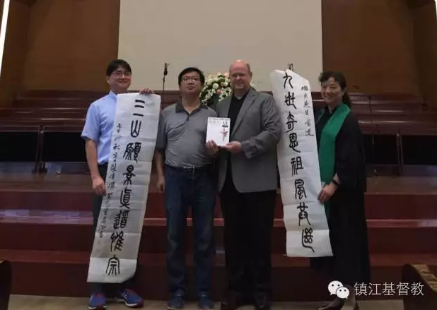 James Hudson Taylor IV stands with the church staff 