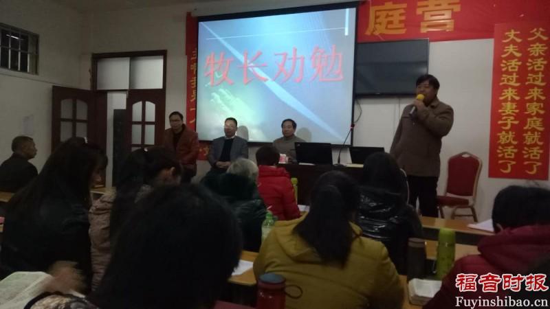 A pastor exhorts the students during the training