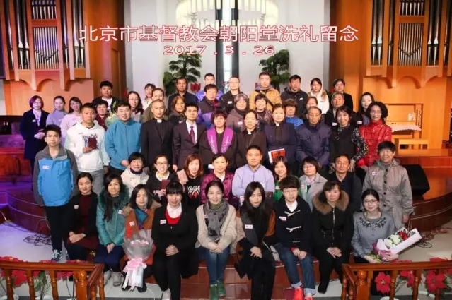 The newly baptized believers with the pastoral staff