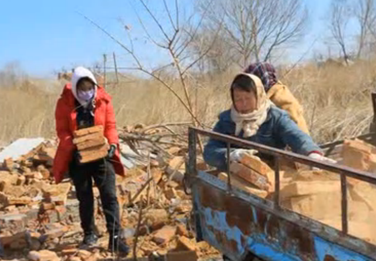 The congregation picked up bricks in late March 2017