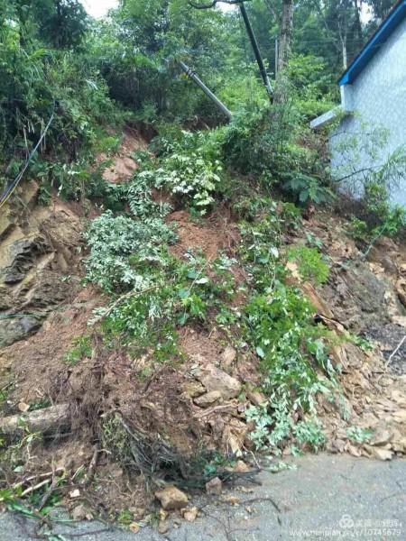 Mud has been washed from the hill behind Kuixi Church.
