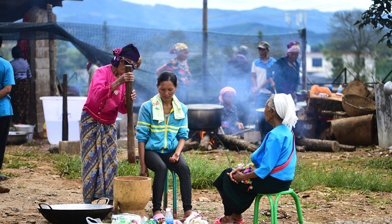 The church members are preparing for loving dinner of the church. They will have dinner together, part of the celebrating.