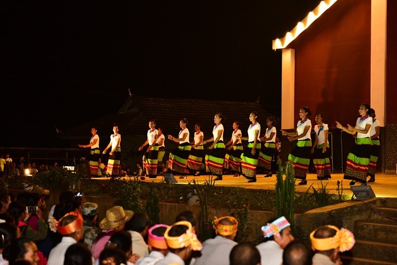 Christian woman dancing and singing, praising God and giving thanks for the harvest.
